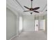 Bedroom view featuring an ensuite bath and walk-in closet at 863 Macaw Cir, Venice, FL 34285