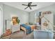 Well decorated bedroom with charming decor, a comfortable bed, and a window to enjoy the view at 9312 Coachman Dr, Venice, FL 34293