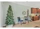 Bright breakfast nook with a wine rack conveniently located next to kitchen cabinets with tiled floors at 9312 Coachman Dr, Venice, FL 34293