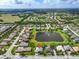 A quiet neighborhood with a scenic lake view and ample green spaces at 988 145Th Street Ne Cir, Bradenton, FL 34212