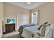 Cozy bedroom features double bed with large closet at 988 145Th Street Ne Cir, Bradenton, FL 34212