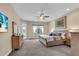 Spacious main bedroom with natural light, carpeting and ample space at 988 145Th Street Ne Cir, Bradenton, FL 34212