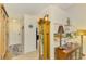Inviting hallway with neutral tones leading to the main living areas of the home at 3008 Sail Pointe Cir # 2C, Venice, FL 34293