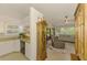 Open living area featuring a neutral color palette and seamless flow into the kitchen at 3008 Sail Pointe Cir # 2C, Venice, FL 34293
