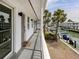 Condo building with covered walkway and waterfront access with boat docks at 1001 Inlet Cir # 269, Venice, FL 34285