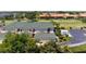 Aerial view of townhomes highlighting green roofs, landscaping, and community layout at 1007 Gondola Park Dr # 1007, Venice, FL 34292