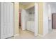 Laundry room with washer and dryer, next to a bathroom with a shower stall at 1007 Gondola Park Dr # 1007, Venice, FL 34292