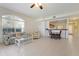 Bright living room features tile flooring, a large window, and comfortable seating at 1007 Gondola Park Dr # 1007, Venice, FL 34292
