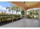 Enjoy the beautiful views from this screened patio with tile flooring and access to landscaped greenery at 1007 Gondola Park Dr # 1007, Venice, FL 34292