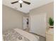 Bedroom featuring a closet, neutral walls, and modern décor, complemented by natural light and wood floors at 12140 Wellen Golf St # 401, Venice, FL 34293