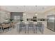 Beautiful kitchen featuring stainless steel appliances, a center island and an open concept dining area at 12140 Wellen Golf St # 401, Venice, FL 34293
