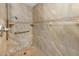 Updated tiled shower with shower wand and grab bar at 1229 Waterside Ln, Venice, FL 34285