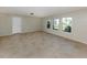 Bright living space features tile floors, fresh paint, and plenty of natural light at 1234 Pinebrook Way, Venice, FL 34285
