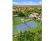Aerial view of the community sports courts with lush landscaping at 1254 Cielo Ct, North Venice, FL 34275
