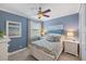 Inviting bedroom with an ample window and coastal-themed décor and furnishings at 1254 Cielo Ct, North Venice, FL 34275