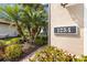 Close-up of house number 1254 with tropical landscaping around the home at 1254 Cielo Ct, North Venice, FL 34275