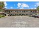 Multi-unit condo building with on-site parking spaces for residents and guests alike at 1258 Barbara Dr # 105, Venice, FL 34285
