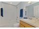 A clean bathroom is equipped with a shower, tub, and towel racks at 12983 Tigers Eye Dr, Venice, FL 34292