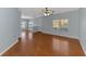 Bright open floor plan with hardwood floors and lots of natural light from the large windows at 12983 Tigers Eye Dr, Venice, FL 34292