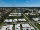 Wide angle of the community, roads, landscaping, and lakes at 131 Sandstone Cir, Venice, FL 34293