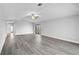 Spacious living room featuring hard surface flooring and neutral paint at 131 Sandstone Cir, Venice, FL 34293