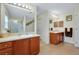 Neutral Primary bathroom showcasing double sinks and a glass-enclosed shower at 13452 High Springs Ave, Port Charlotte, FL 33981