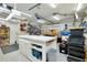 Spacious garage featuring ample storage and workbench areas at 13452 High Springs Ave, Port Charlotte, FL 33981