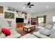 Spacious living room with comfortable sofas, stylish decor, and a welcoming atmosphere at 13452 High Springs Ave, Port Charlotte, FL 33981