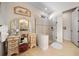 Bright bathroom with glass shower, vanity area, and charming decor at 13897 Umbria St, Venice, FL 34293