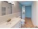 Clean bathroom with white vanity, tiled floor, and modern fixtures, offering a fresh and functional space at 1460 Everest Rd, Venice, FL 34293