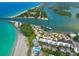 Breathtaking aerial view of waterfront homes, beach, and the Gulf of Mexico at 1555 Tarpon Center Dr # 156, Venice, FL 34285