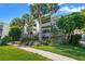 Lovely Condo with lush landscaping, mature palms and a relaxing atmosphere at 1555 Tarpon Center Dr # 156, Venice, FL 34285