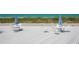 Outdoor patio with dining sets, perfect for seaside enjoyment at 1555 Tarpon Center Dr # 156, Venice, FL 34285