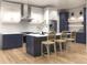 Well-equipped kitchen featuring an island with bar seating, modern appliances, and sleek cabinetry at 1804 Nimbus Dr, North Port, FL 34287