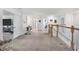 Hallway on the second floor leading to multiple rooms at 1951 E Isles Rd, Port Charlotte, FL 33953