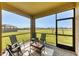Outdoor lanai overlooking the neighborhood at 1951 E Isles Rd, Port Charlotte, FL 33953