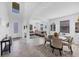 Bright living room featuring tile floors, an open floor plan, and a staircase to the second floor at 1951 E Isles Rd, Port Charlotte, FL 33953