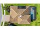 Aerial shot of the roof, showing the pool and solar panels at 19825 Bridgetown Loop, Venice, FL 34293