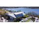 Elegant event space with water views, surrounded by manicured gardens and an outdoor ceremony setup at 19825 Bridgetown Loop, Venice, FL 34293