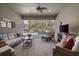 Inviting covered patio with a view of the screened-in pool area at 19825 Bridgetown Loop, Venice, FL 34293