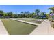 Enjoy outdoor recreation on the beautiful bocce ball courts, surrounded by lush landscaping and shady trees at 20479 Pezzana Dr, Venice, FL 34292