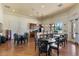 Clubhouse area with tables, chairs, and a kitchenette at 20479 Pezzana Dr, Venice, FL 34292