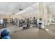 Well-equipped fitness center offering a variety of exercise machines, natural light, and space for a full-body workout at 20479 Pezzana Dr, Venice, FL 34292