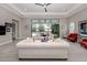 Spacious living room offers modern furniture and a seamless transition to the outdoor pool area at 208 Corelli Dr, Nokomis, FL 34275