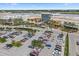 Aerial view showcasing the Mall at University Town Center's parking lot and the architecture of surrounding businesses at 214 Whispering Oaks Ct, Sarasota, FL 34232