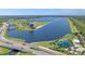 Panoramic aerial view of the Nathan Benderson Park regatta center, offering vast expanse of water and shoreline at 214 Whispering Oaks Ct, Sarasota, FL 34232