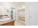 Clean bathroom with double sinks, a large vanity, and a shower/tub combination behind a shower curtain at 25525 Lambert Ln, Punta Gorda, FL 33950