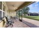 Enclosed brick patio with views of the backyard at 25525 Lambert Ln, Punta Gorda, FL 33950