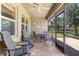 Screened patio with seating area at 25525 Lambert Ln, Punta Gorda, FL 33950