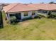 A well-maintained lawn and patio area enhance the outdoor living space at 288 Soliera St, Nokomis, FL 34275